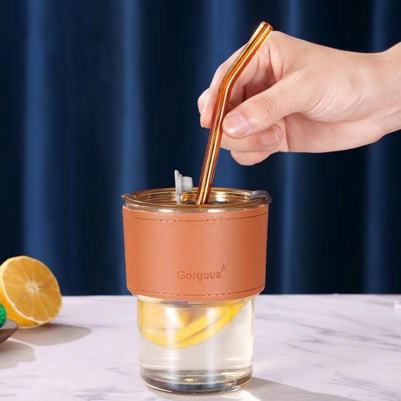 1779775840_Modern Glass Coffee Tumbler with Sleeve & Straw- 1